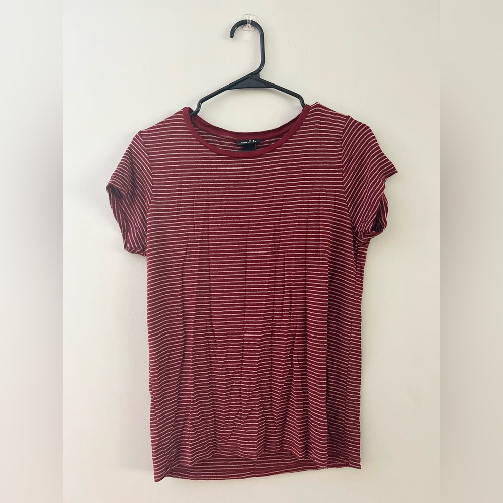 Medium maroon and white striped t-shirt.